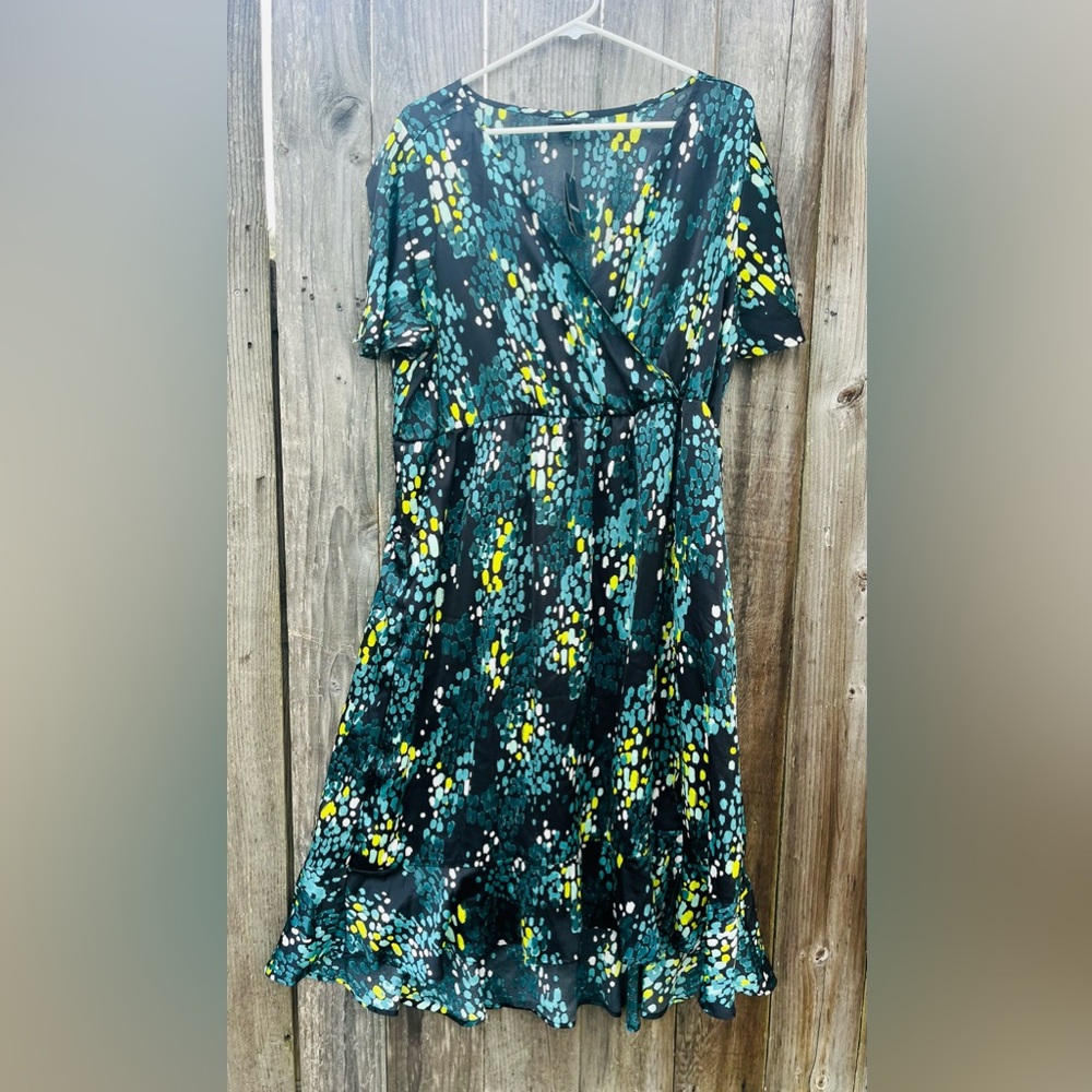 Torrid fluttery teal
And black dress size 1